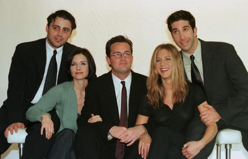FILE PHOTO: The cast of the American TV sitcom `Friends` (L to R) Matt Le Blanc, Courteney Cox, Matthew Perry, Jennifer Aniston and David Schwimmer pose for pictures at Channel 4 Television centre Mar 25, 1998.