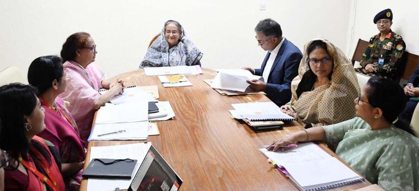 Prime Minister Sheikh Hasina is witnessing a power-point presentation on the realignment of  the Dhaka Elevated Expressway at PMO on Sunday. Photo PID