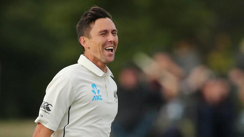 FILE PHOTO: Cricket - New Zealand v India - Second Test - Hagley Oval, Christchurch, New Zealand - Mar 1, 2020 New Zealand`s Trent Boult celebrates bowling India`s Cheteshwar Pujara REUTERS