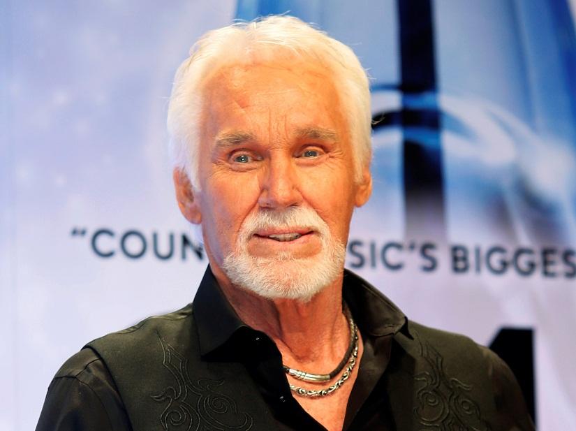 FILE PHOTO: Kenny Rogers poses backstage after accepting the Willie Nelson Lifetime Achievement award at the 47th Country Music Association Awards in Nashville, Tennessee, US, Nov 6, 2013. REUTERS