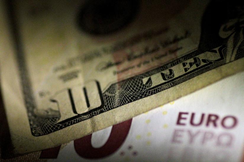 FILE PHOTO: An illustration photo of the U.S. dollar and the euro./File Photo