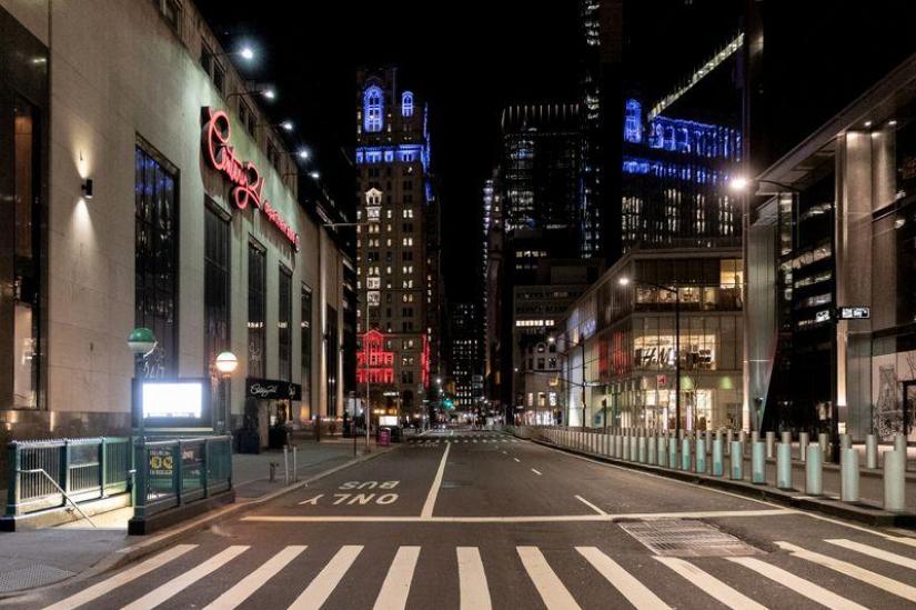 An empty street is seen near Wall street during the outbreak of the coronavirus disease (COVID-19) in Brooklyn, New York City, US, Mar 27, 2020. REUTERS