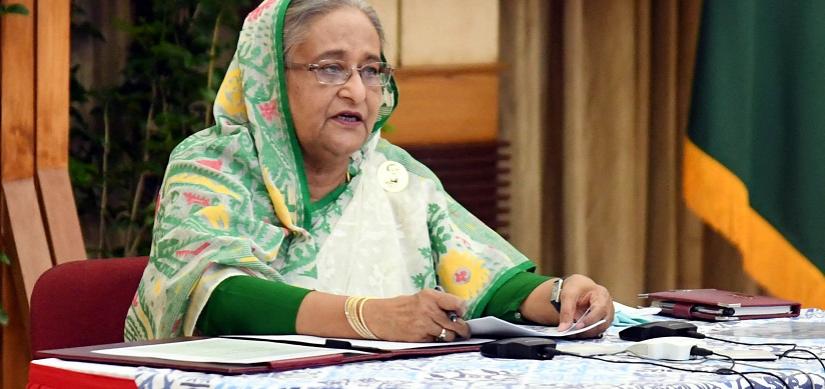 Prime Minister Sheikh Hasina speaking with officials of 64 districts via a video conference that started at 10am from her official residence Ganabhaban on Tuesday (Mar 31).